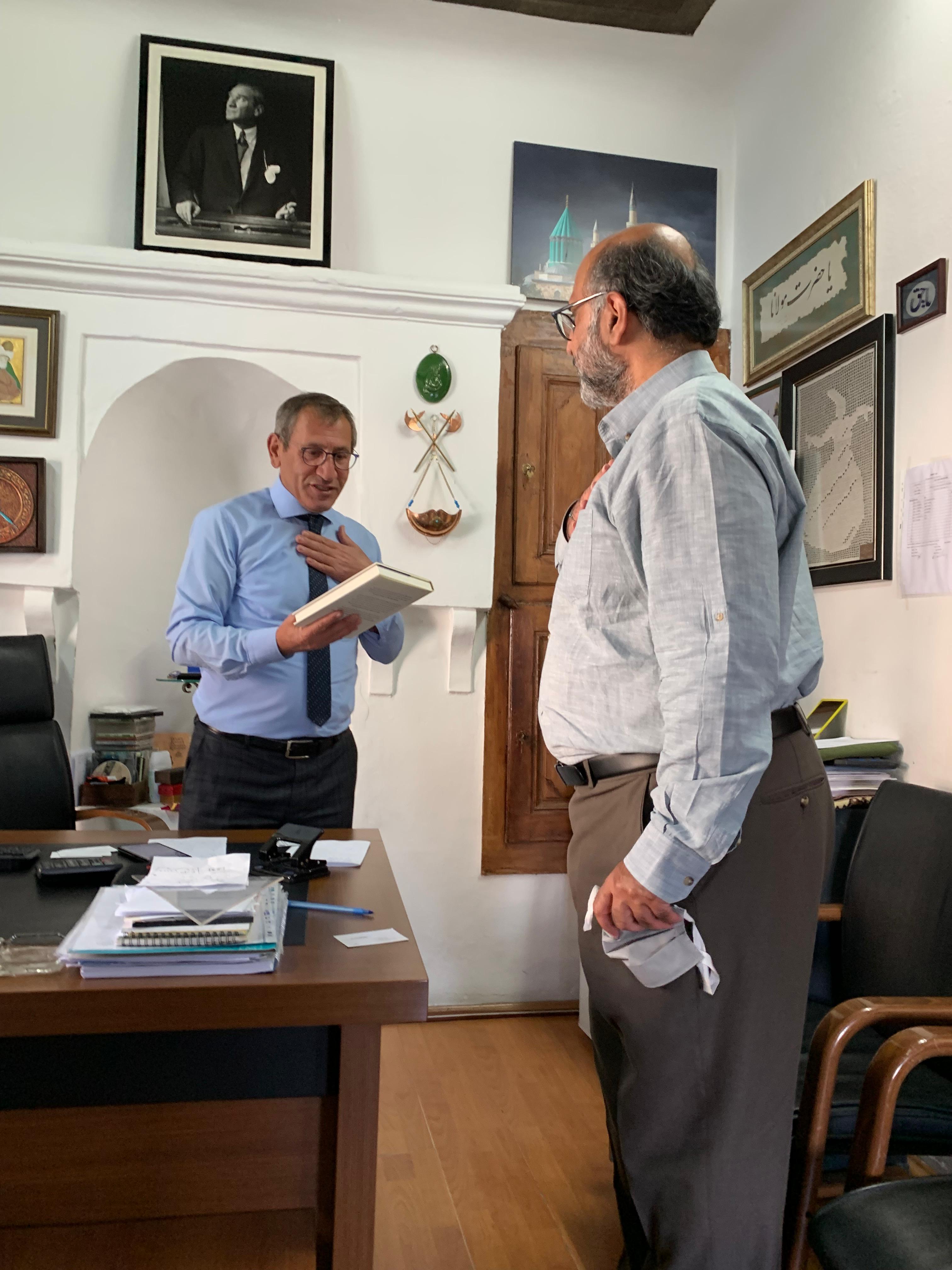 Dr. Hassan Abbas — Policy Consultation · Plate 77